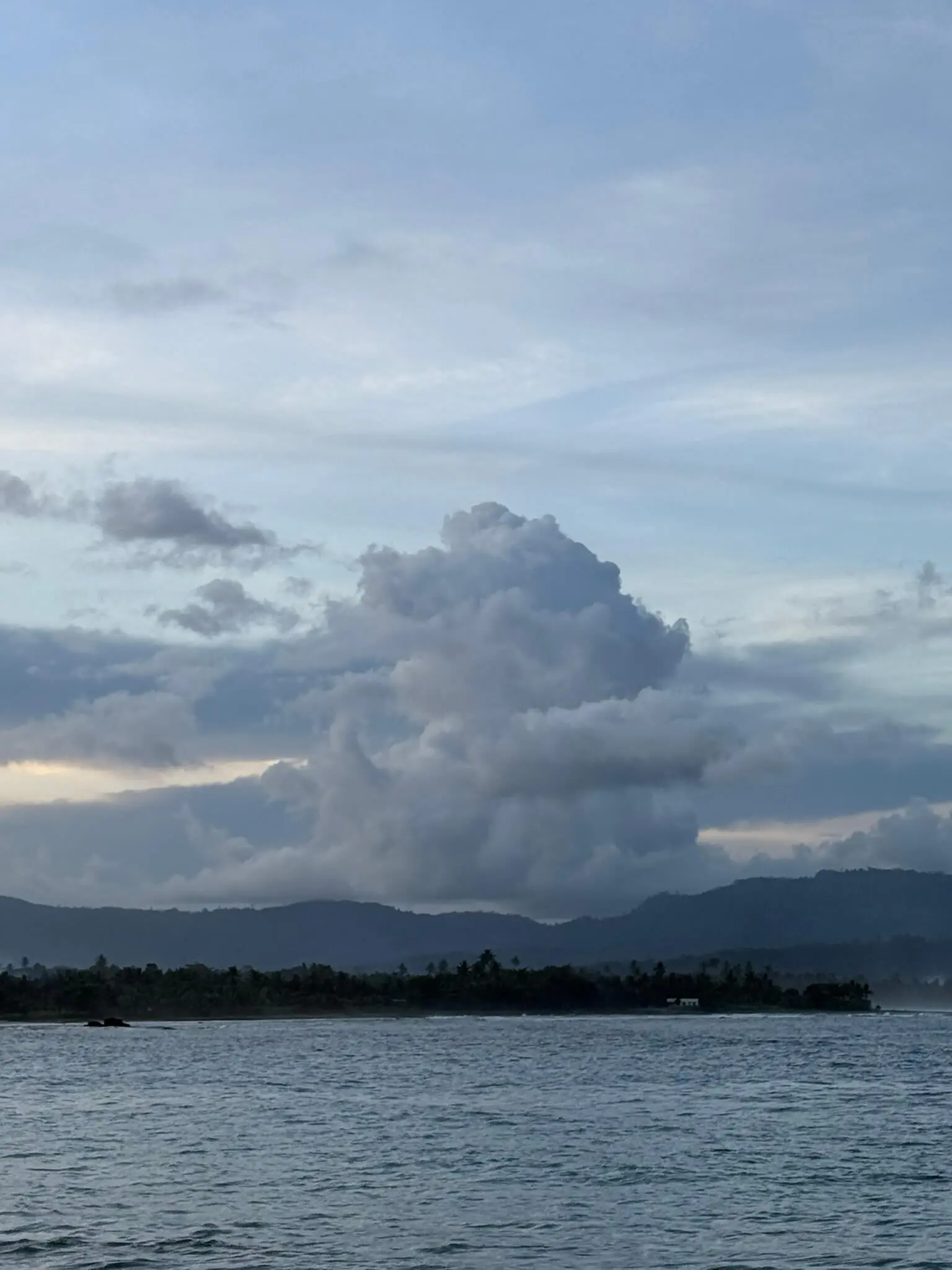 cumulus clouds in the sea